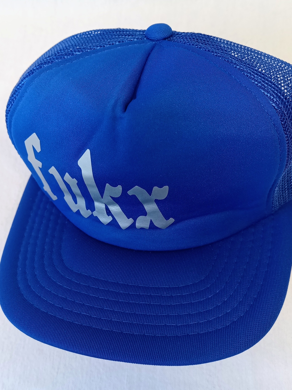 Solid Blue 5-Panel Trucker Hat w Silver Script & Small Feather Detail